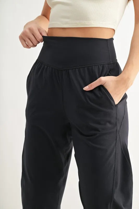 MONO B Flowbarrel High Waist Active Pants with pockets, lightweight, and buttery-soft stretch fabric.