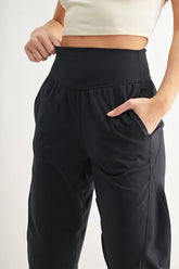 MONO B Flowbarrel High Waist Active Pants with pockets, lightweight, and buttery-soft stretch fabric.